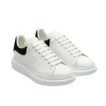 Alexander McQueen Oversized Low-Top Leather Sneaker - White / Black Suede Heel - Image 2