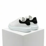 Alexander McQueen Oversized Low-Top Leather Sneaker - White / Black Suede Heel - Image 3