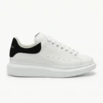 Alexander McQueen Oversized Low-Top Leather Sneakers - White / Black Suede Heel Tab